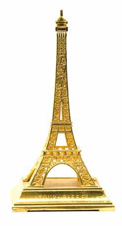 Torre Eiffel dorada con soporte