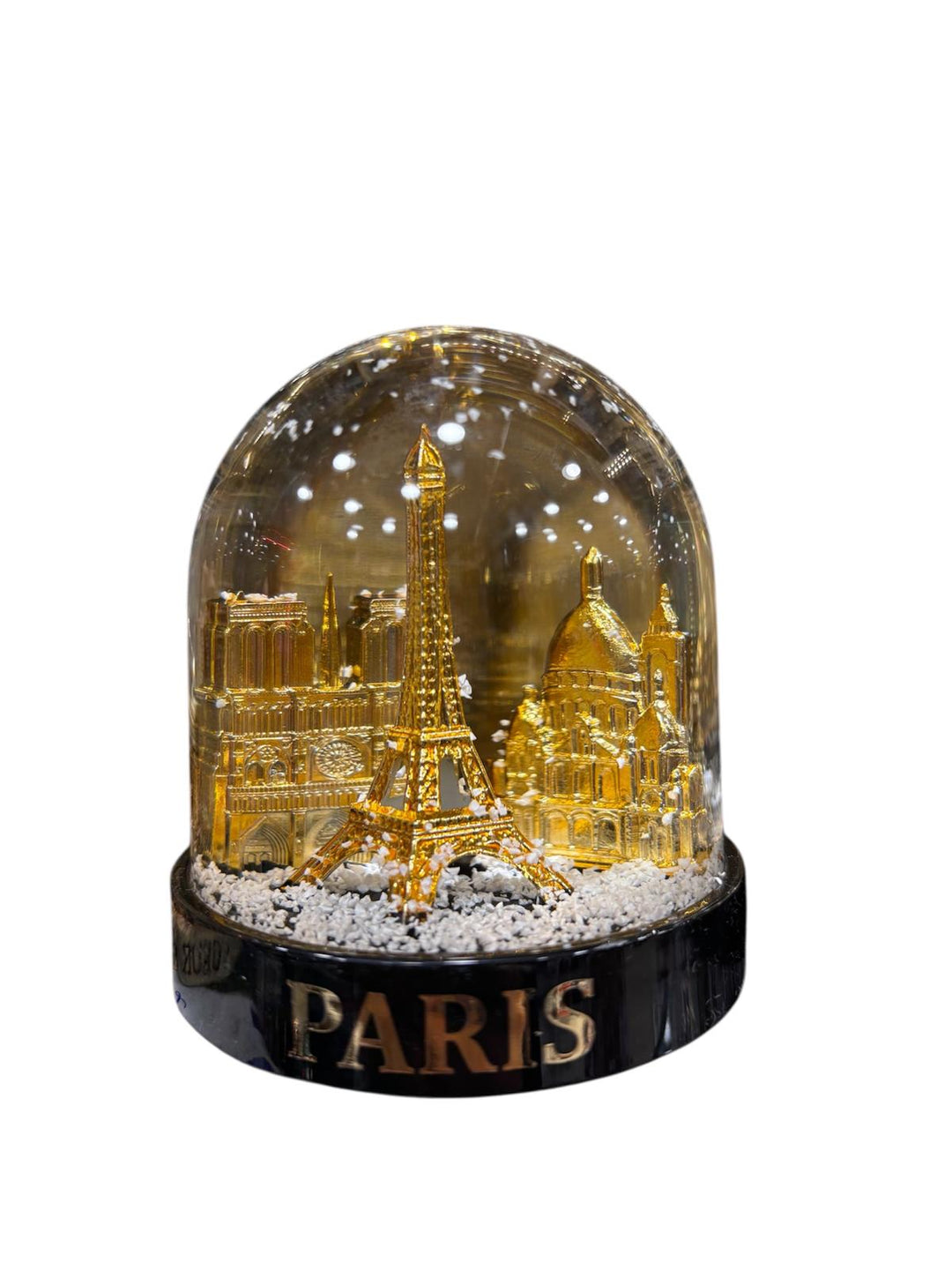 Big snowball Eiffel tower and monuments of Paris