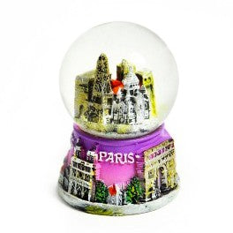 Boule de neige avec des monuments de Paris en couleur violet, dimension 5.5 cm x 3.8 cm. Souvenir Paris