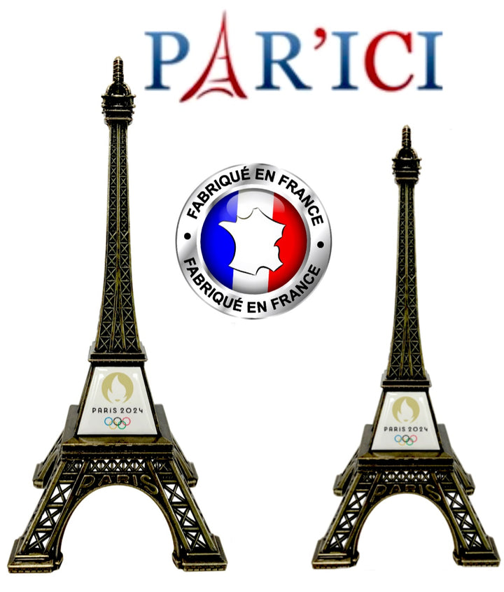 Miniature de la Tour Eiffel commémorant Paris 2024, symbolisant l'esprit des Jeux Olympiques.